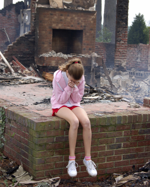 Girl Crying After House Burns Down